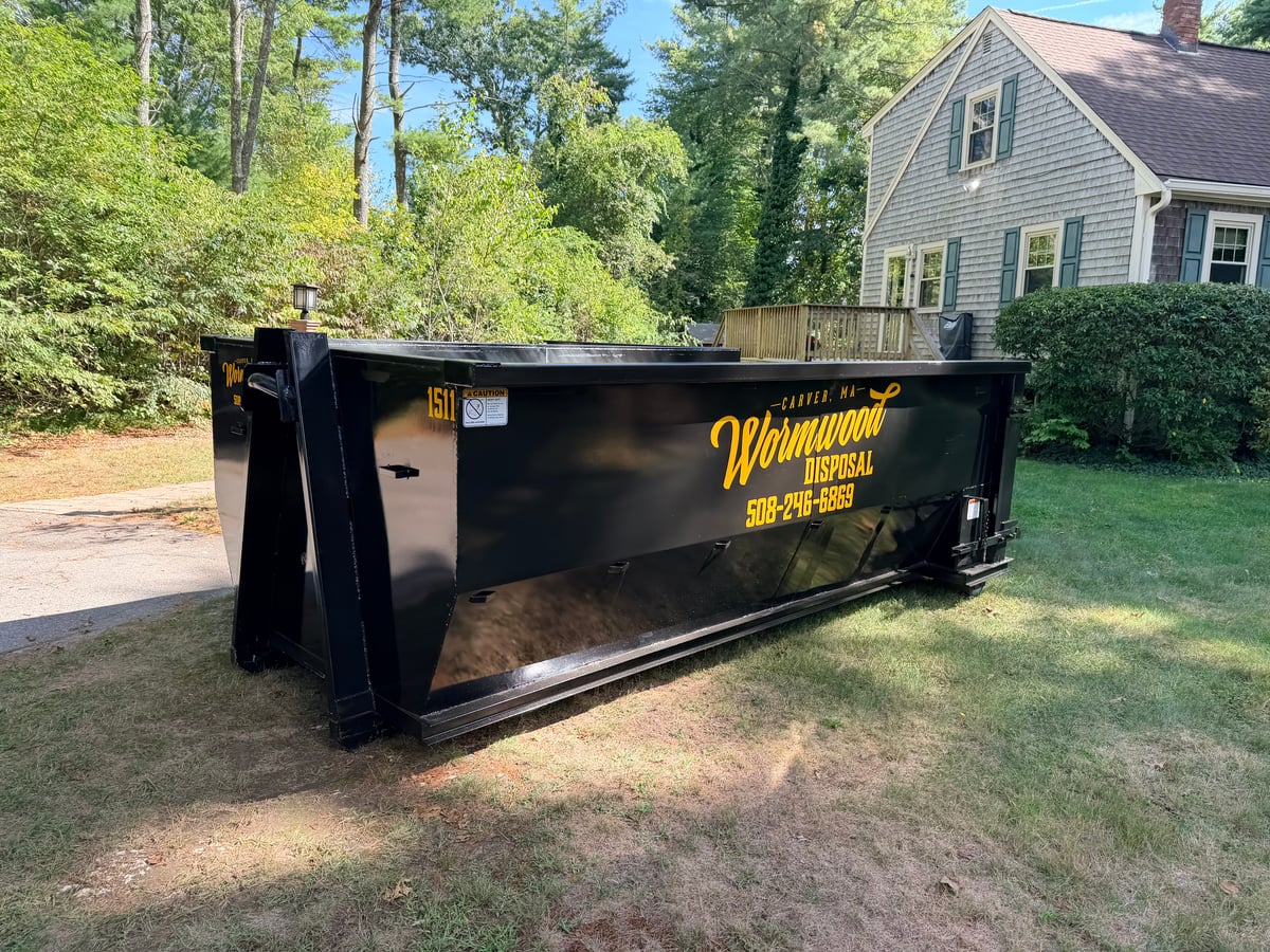 Wormwood Disposal dumpster on residential property