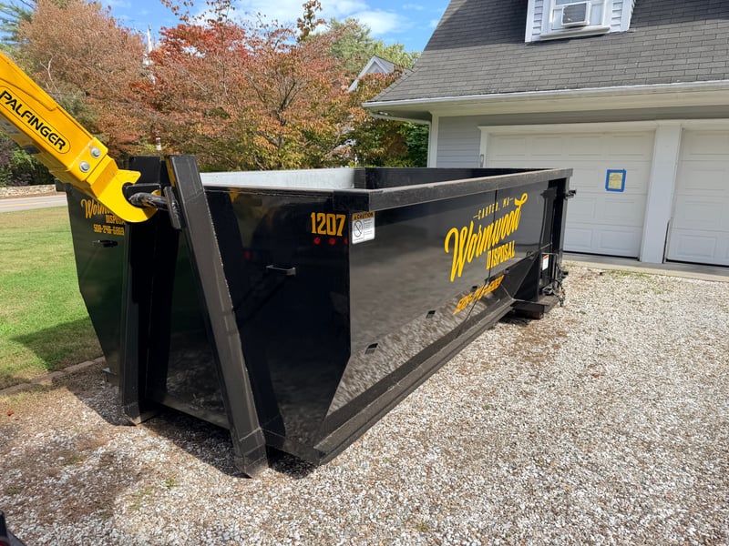 Roll off dumpster delivered to residential driveway in Bourne, MA