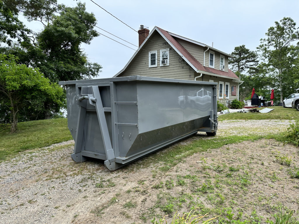 Dumpster In A Driveway