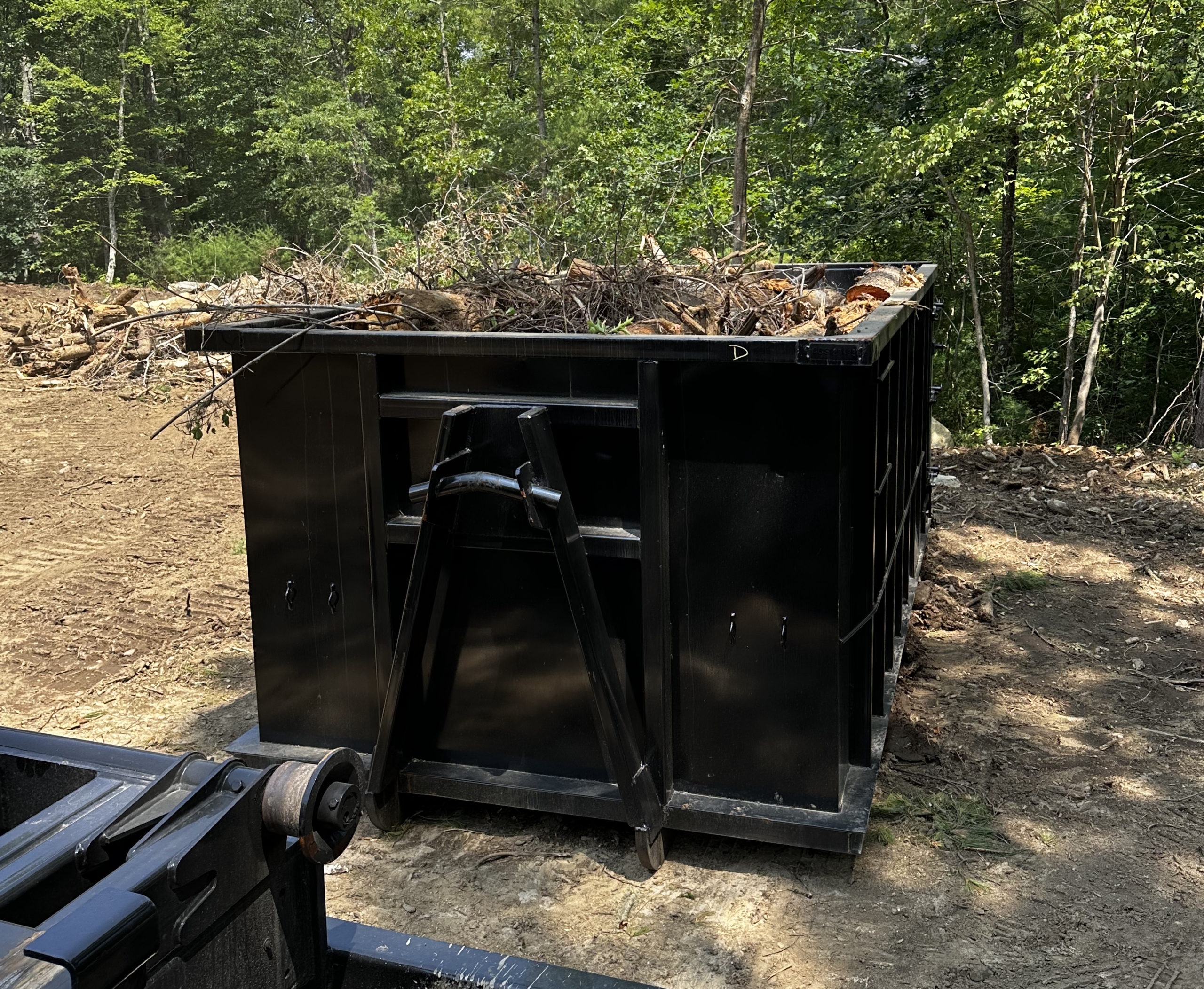 20 Yard Dumpster Full Of Stumps And Yard Waste in Rochester, Ma