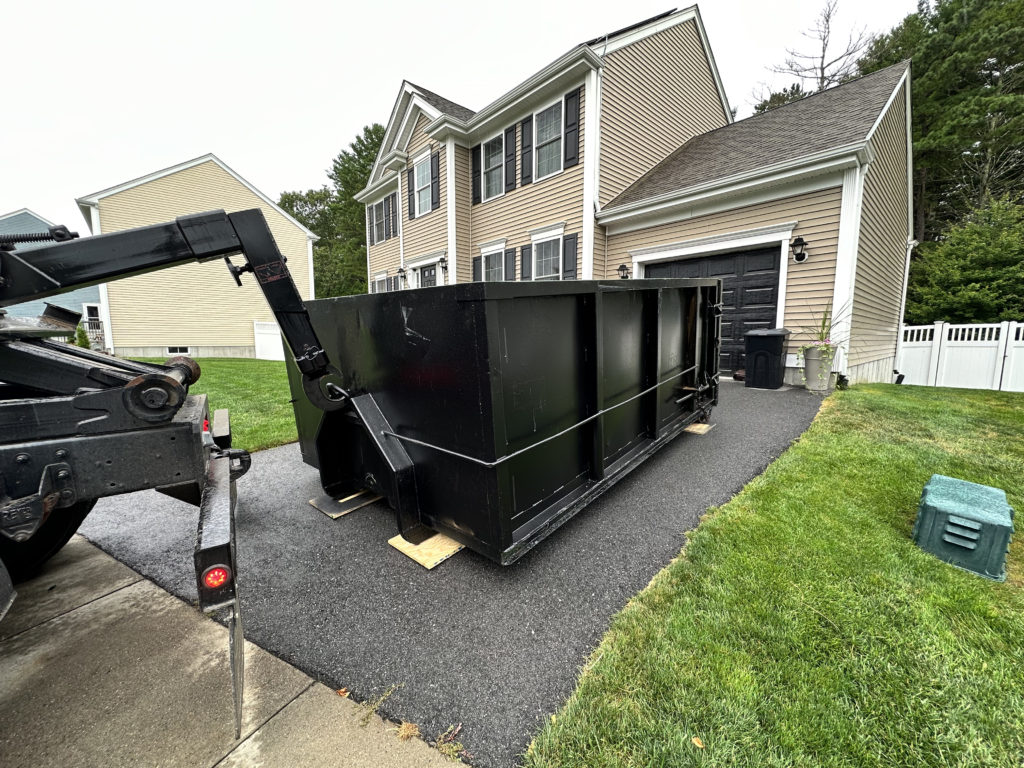 12 Yard Dumpster Placed In A Driveway In New Bedford, Ma
